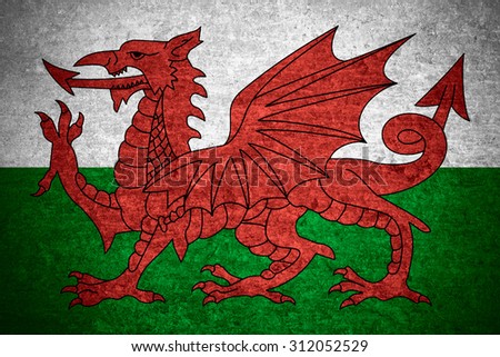 flag of Wales or Welsh banner on old metal texture background
