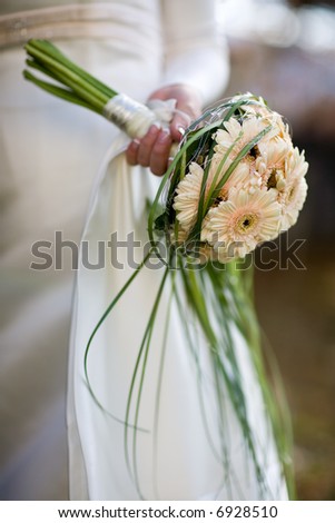 Bridal bouquet holding by the bride - small DOF.