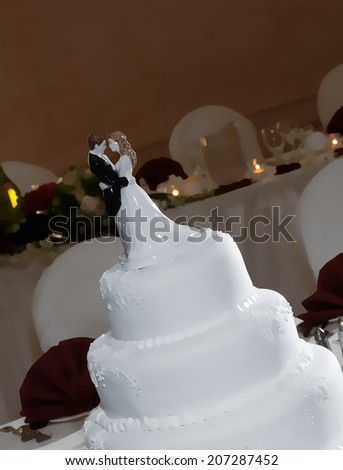 A white wedding cake with figurines of the bride and groom, illustration