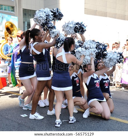 TORONTO-JULY 04: Toronto University cheer leaders participate at Pride parade in Toronto, July 04, 2010