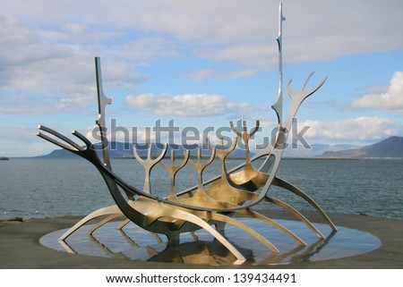 REYKJAVIK, ICELAND - AUGUST 10: Sculpture \'The Sun Voyager\' on August 10, 2008 by the sea in the centre of Reykjavik, Iceland. Designed by Jon Gunnar Arnason in stainless steel in 1971.