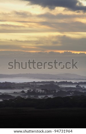 Early morning mist creates a magical mood over the north Gower countryside in south Wales