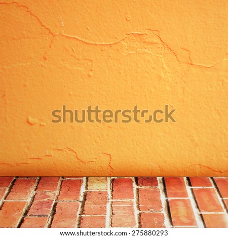 room interior vintage with brick wall and cement orange floor background