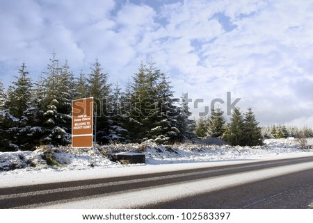 welcome to Kerry road sign in snow scene in irish speaking area of county Kerry Ireland
