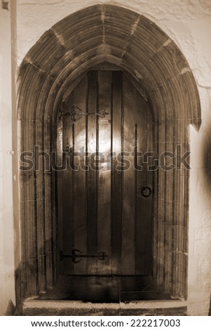 door at the chapel of Holycross abbey county Tipperary Ireland in sepia