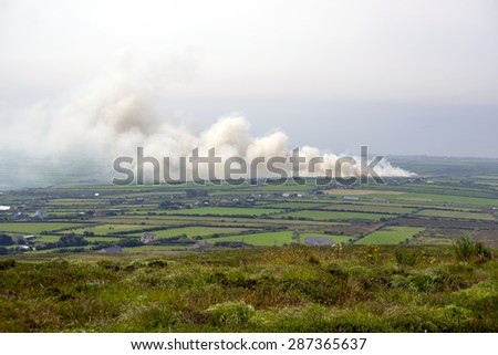 fields on fire in the countryside of kerry ireland