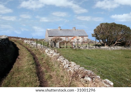 a derelict house in the irish countryside in county kerry ireland
