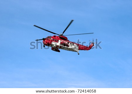 BALLYBUNION,IRELAND-MARCH 2: Irish sea rescue helicopter searches for missing person near cliffs on March 2,2011 in Ballybunion, county Kerry, Ireland. The cliffs are often used in suicide attempts.