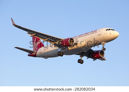 LOS ANGELES, CALIFORNIA/USA - MAY 24, 2015. Virgin America Airbus A320  lands at Los Angeles Airport (LAX) on May 24, 2015.