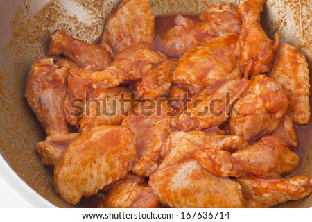 New orleans wings,Raw chicken wings in spice prepare for cooking