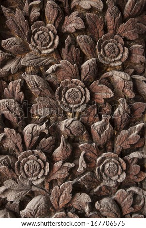 Wooden flower and leaves pattern carving background