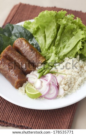 Thai Corn - Fish Salad ,Thai dish shredded fish mixed with slices of pork skin sausage
