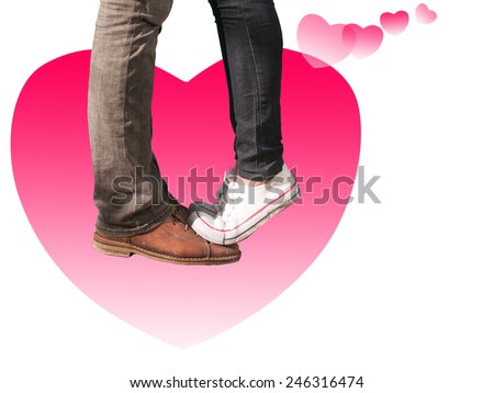 Girl\'s feet stand on Boy\'s feet for Love in heart shape,close up