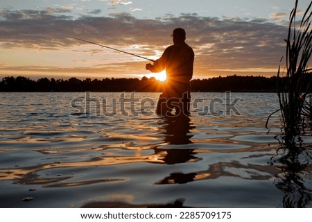Similar – Image, Stock Photo Angler on the water
