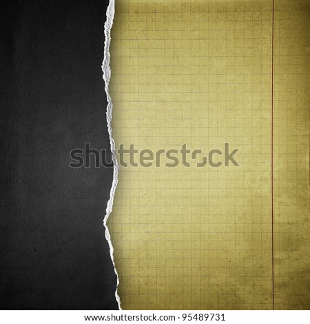 riped black cardboard cover on cell paper background