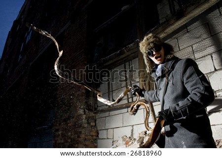 steampunker in industrial scary place is attacking