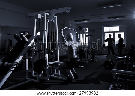 Bodybuilder\'s training in the gym