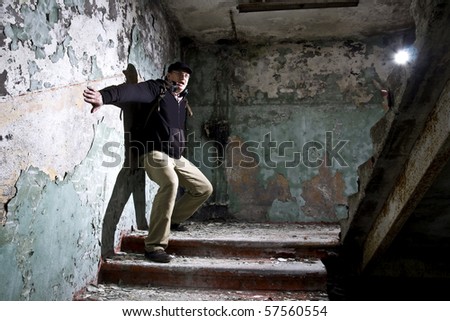 man in scary industrial place
