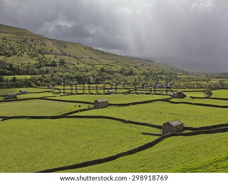 Rainstorm passing down the valley at Gunnerside, Swaledale, North Yorkshire