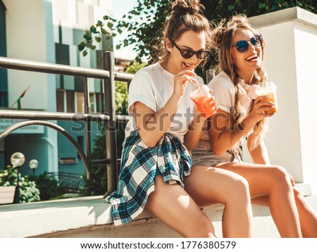 Similar – Image, Stock Photo two plastic cups with liquor stand on a wooden table