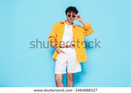 Similar – Image, Stock Photo An young and attractive Indian Bengali brunette woman in active wear is doing yoga after waking up in the morning in front of window in her room. Indian lifestyle.