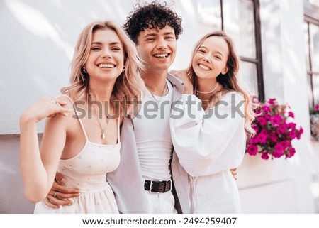 Similar – Image, Stock Photo Three girlfriends having fun taking a selfie