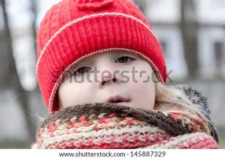 Little girl in red hat