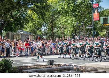 NEW YORK CITY - JULY 10: A band plays during the ticker-tape parade on July 10, 2015 in NYC. The parade has been organized to celebrate the U.S. women\'s soccer team\'s World Cup final win.