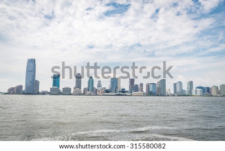 NEW YORK CITY - JULY 13: View on Jersey City on July 13, 2015 in New York. Jersey City is the second-most populous city in the U.S. state of New Jersey.