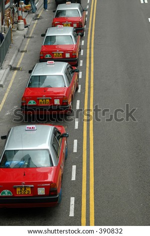 a line of hong kong taxis in central district