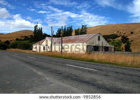 Barn or paddocks on a  sheep ranch/farm in New Zealand