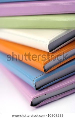 Stack of notebooks  with color  leather cover