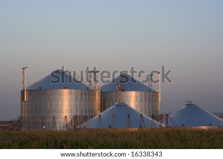 View of grain silos at sunset