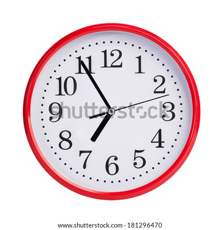 Five to seven on a red round clock face