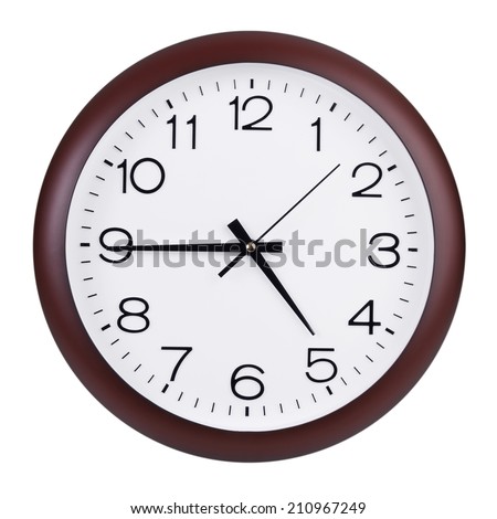 Quarter to five on a round clock face