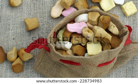 Jute bag with ginger nuts and candies, typical Dutch treat for Sinterklaas on 5 decembe
