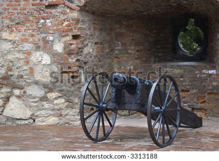 an ancient cannon in a fortress