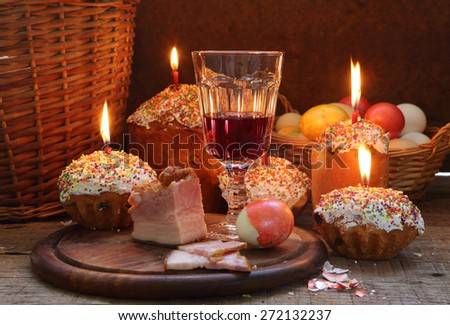 Easter still-life with wine, Easter cakes and the painted egg