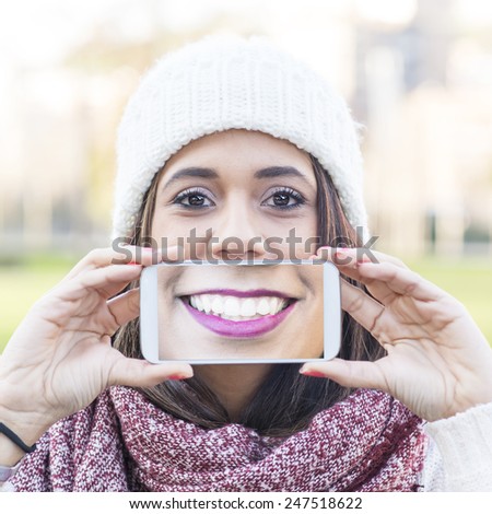 Selfie portrait of smile white teeth of happiness latin woman.
