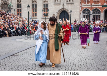BRUGES, BELGIUM - MAY 17: Annual Procession of the Holy Blood on Ascension Day. Locals perform  dramatizations of Biblical events - Saint Mary and Joseph. May 17, 2012 in Bruges (Brugge), Belgium