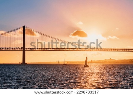 Similar – Foto Bild Ponte 25 de Abril Brücke in Lissabon während Sonnenuntergang mit Schiff und Jesus-Denkmal, bewölkten Himmel portugal