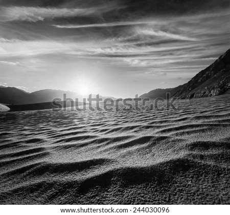 Sand dunes in Himalayas on sunrise. Hunder, Nubra valley, Ladakh, India. Black and white version