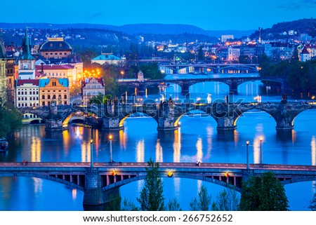 Travel Prague concept background - elevated view of bridges over Vltava river from LetnÃ?Â¡ Park. Prague, Czech Republic in twilight