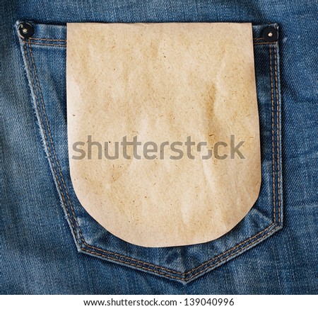 Paper tag on blue denim jeans pocket
