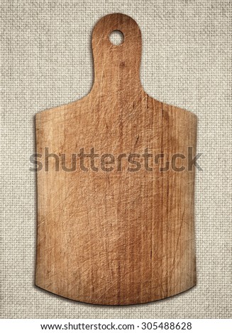 Old cutting board used for cooking. Wood texture.
