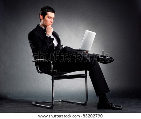 young business man with laptop