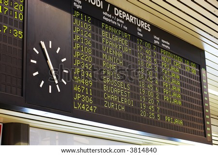 clock at the arrival-departure board