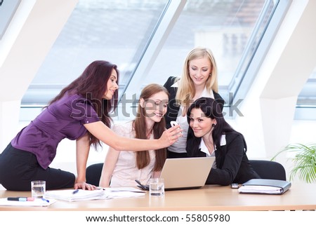 business women laughing in the work break