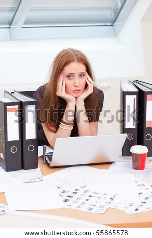 business woman is getting really tired of her work