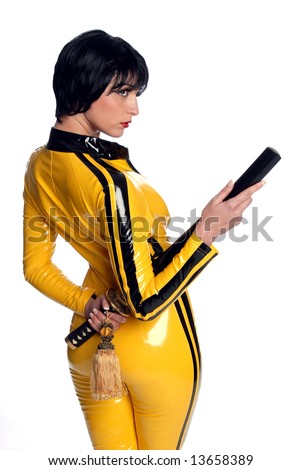Beautiful woman in yellow latex jump suit with samurai sword